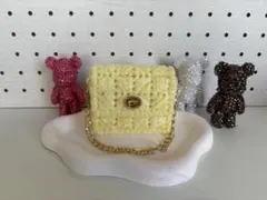 黄色いちいさな編み込み ポーチ チェーン付き