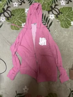UNDEFEATED ジップアップパーカー ピンク Mサイズのサムネイル