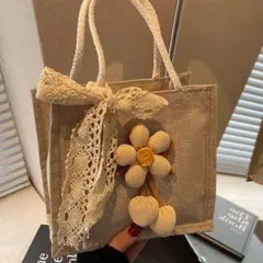 新品　花モチーフのベージュかごバッグ
