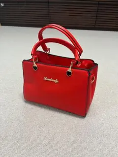 レディース ショルダーバッグ 赤色 外内ポケット付