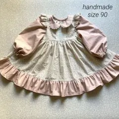 ピンクのお花畑お散歩ワンピース　〜ミニ丸えりエプロンワンピース 90〜