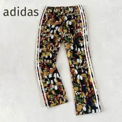 入手困難adidas × JEREMY SCOTT ハイビスカス柄トラックパンツ - メルカリ