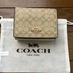 COACH 三つ折り財布 ベージュ