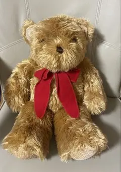 テディベア ぬいぐるみ 赤いリボン付きのサムネイル