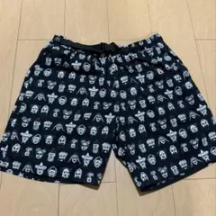 GYMMASTER 総柄 顔 ショートパンツ メンズのサムネイル