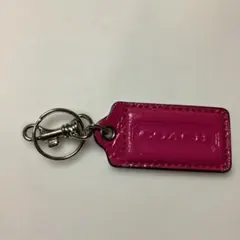 新品コーチ　ピンク革製プレート　真鍮　キーリング／バッグチャーム