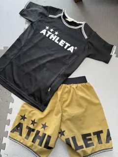 ATHLETA サッカーウェアセット 黒金　140 ジュニア