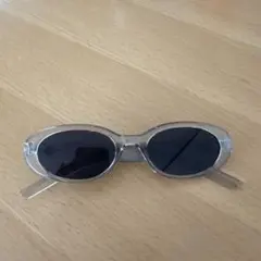 クリアフレーム オーバルサングラス ブラックレンズ