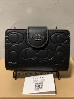 新品未使用　COACH ブラック 二つ折り財布 中古・古着通販】COACH (コーチ) 2つ折り財布 ブラック