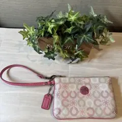 美品‼️COACH（コーチ）ポーチ　ピンク　お財布ポーチ　持ち手付き