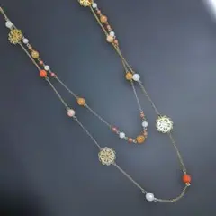 中古✨ビーズロング２連ネックレス✨ゴールドオレンジピンク白淡色　フラワー型パーツ