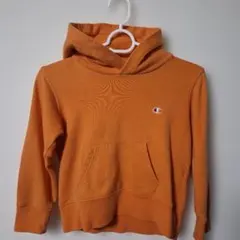 Champion オレンジ フード付きパーカー