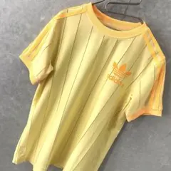 adidas デカロゴ ストライプ リンガーTシャツ イエロー XS 丈短