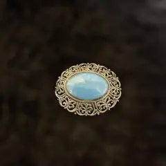 アンティーク〜ヴィンテージのターコイズ色ブローチ 金属製