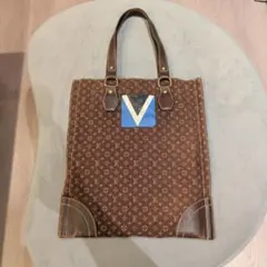 Louis Vuitton イニシャル タンジェ モノグラム トートバッグのサムネイル