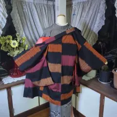 羽裏も華やか、色合いも雰囲気たっぷりの正絹銘仙のアンティーク長羽織です