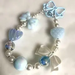 ビーズスマホストラップ水色ハンドメイドリボンハート