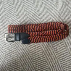 オレンジと黒の編み込みベルト