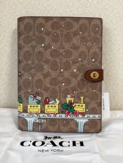 新品COACH クリスマス限定 シグネチャー 手帳