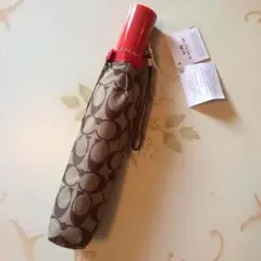 新品 コーチ正規品折りたたみ傘