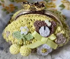 くまモチーフの黄色いがま口財布