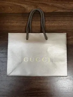 GUCCI 紙袋　ショッパー　ギフト袋　ブロンズのサムネイル
