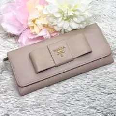 美品✨PRADA サフィアーノ 長財布 フィオッコ リボン フラップ ベージュ 美品✨PRADA サフィアーノ 長財布 フィオッコ リボン フラップ