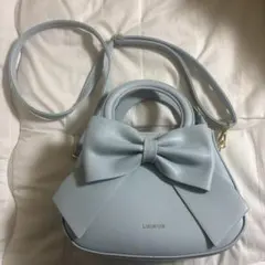 リボン付きライトブルーショルダーバッグ