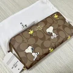 保存袋未使用未開封コーチCOACH Snoopyコラボ 長財布 シグネチャー本物