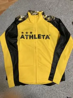 ATHLETA ピステ・ウィンドブレーカー Mサイズ