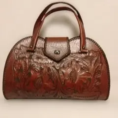 週末限定 お値下げです。 本革　手彫り花柄レリーフ編み込みハンドバッグ