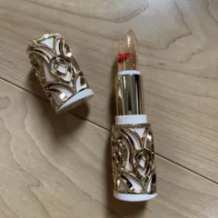 透明リップスティック ゴールド装飾付き