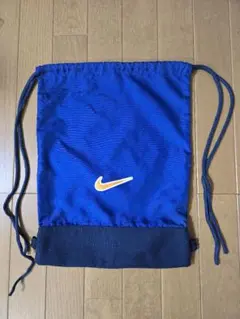 NIKE　ナイキ　ナップザック　スポーツバッグ　紺系　オレンジ　ロゴ　マーク