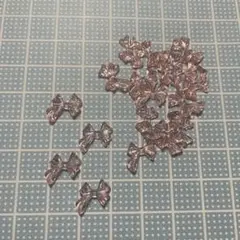 ②リボンネイルパーツ クリアピンク 18個