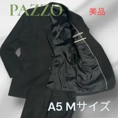 美品PAZZO collectionsビジネススーツ　ブラックストライプA5 Mのサムネイル