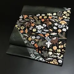 ［6800］袋帯 美品 宝尽し 唐織 金糸 黒 正絹 着物 フォーマルのサムネイル