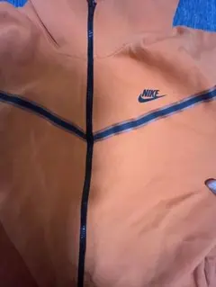 NIKEナイキオレンジ ジップアップパーカー