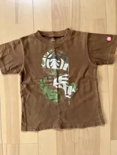 ブラウン グラフィックプリント Tシャツのサムネイル