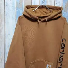☆カーハート☆スウェットパーカー☆タグロゴ☆袖ロゴプリント☆キャメル☆Ｌ