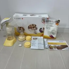 medela メデラ　ハーモニー手動搾乳器　母乳パッド付