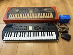 CASIO UK-01 ミニキーボード 32鍵盤☆ACアダプター付き - メルカリ