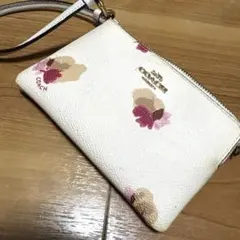 COACH 花柄レザーポーチ