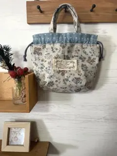 ハンドメイド品 ブルー系花柄♪ミニタック入り巾着袋裏地つき♪