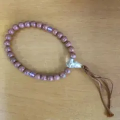 茶色と紫のビーズの数珠