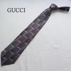 【美品】グッチ ネクタイ 茶色 幾何学模様柄 絹 高級感【n3917】