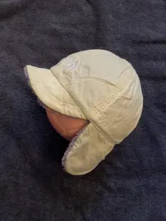 The North Face 耳あて付きキャップ クリーム/パープル