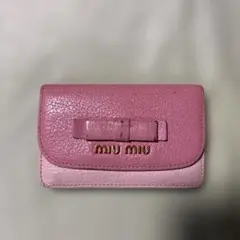 美品！miu miu リボン付き名刺入れ ピンク/ブラック miu MIUMIU ミュウミュウ ロゴ リボン 長財布（小銭入れあり） レザー