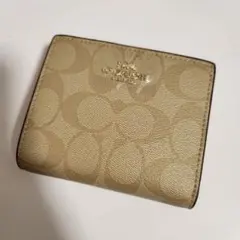 ​【新品・未使用】COACH コーチ 二つ折り財布 シグネチャー ピンク 付属品