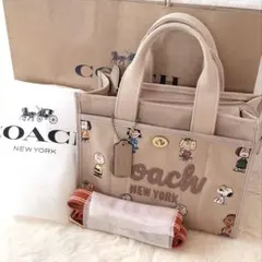 2025新作 希少COACH カーゴトート　スヌーピー柄　トートバッグ