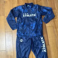 ATHLETA ピステ・ウィンドブレーカー ネイビー　150